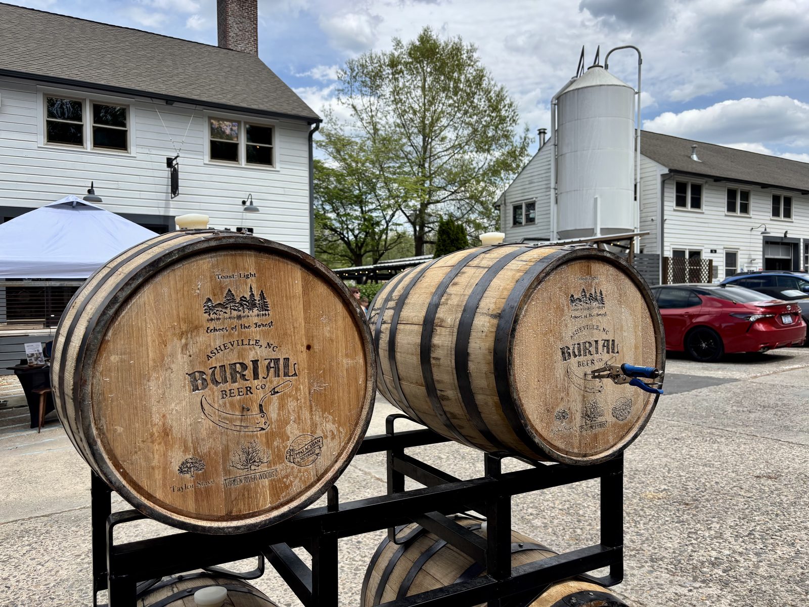 Branded oak barrels at Burial Beer Co.